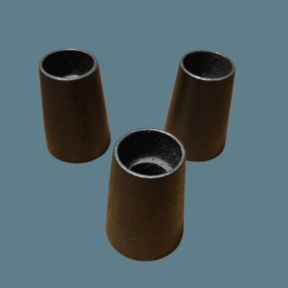 Set of 3 Hand forged Cast Iron tapered candlestick holders.